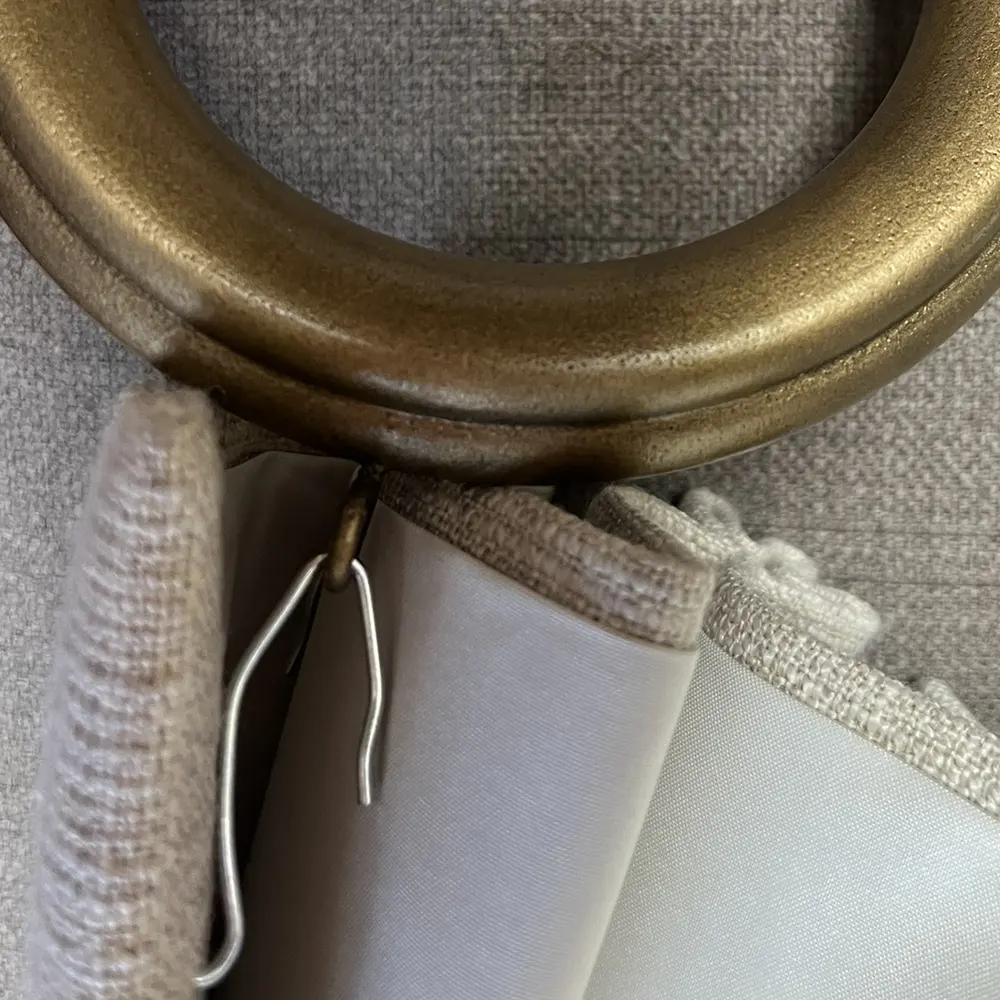 drapery pins in a curtain ring eyelet