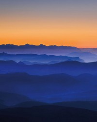 Orange Sunset Mountains Wall Mural by   